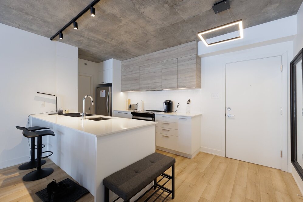 Kitchen - Marble countertops and clean lines stylish kitchen