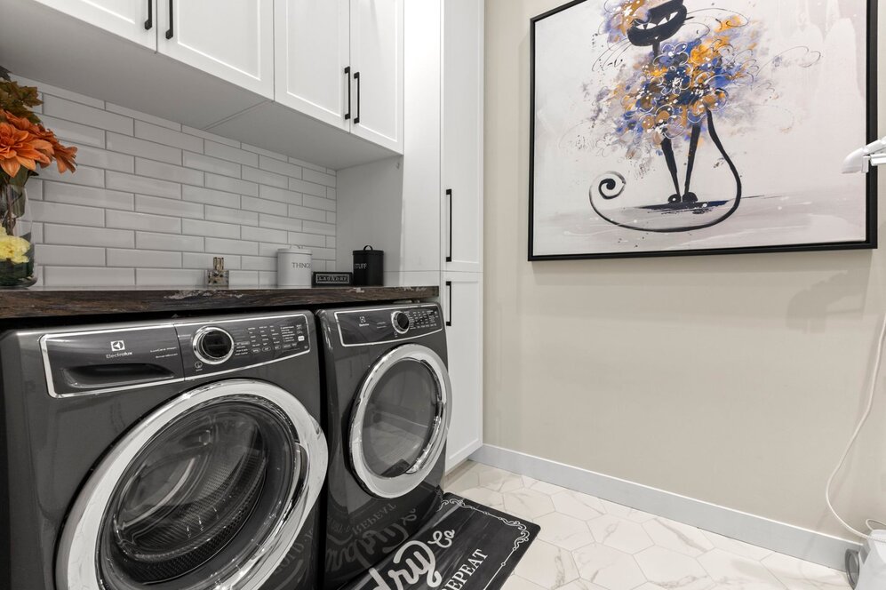 Laundry room - Separate laundry room with washer and dryer includ