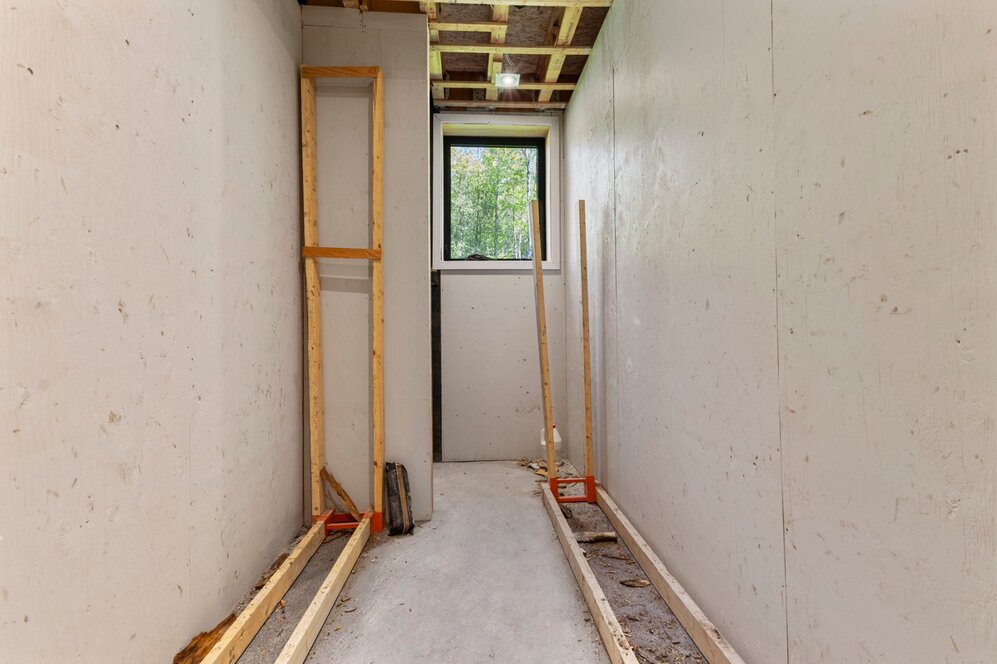 Other - Wood storage with elevator for the main floor fire