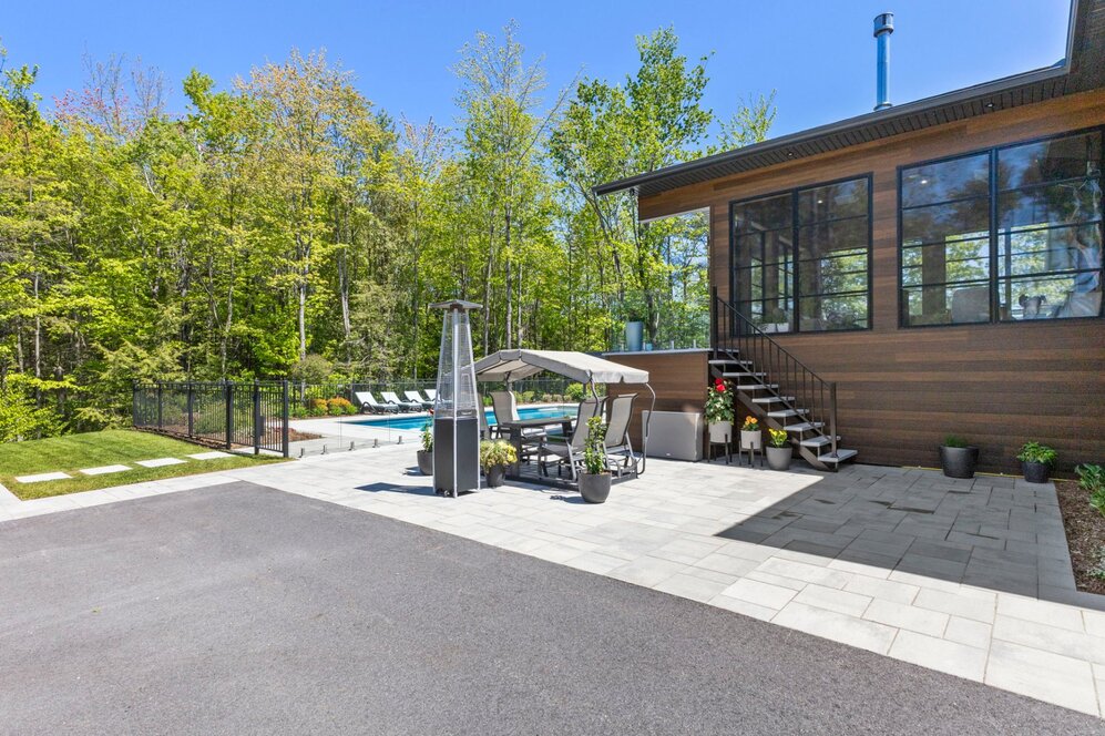 Backyard - Asphalt driveway done in 2023