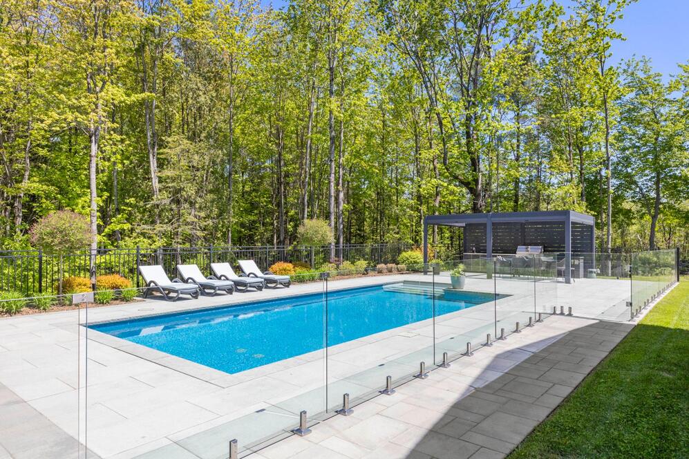 Pool - Heated and landscaped pool.