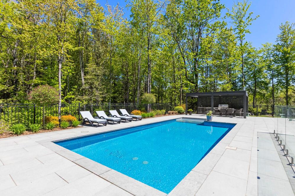 Pool - Heated pool fully enclosed with glass fencing