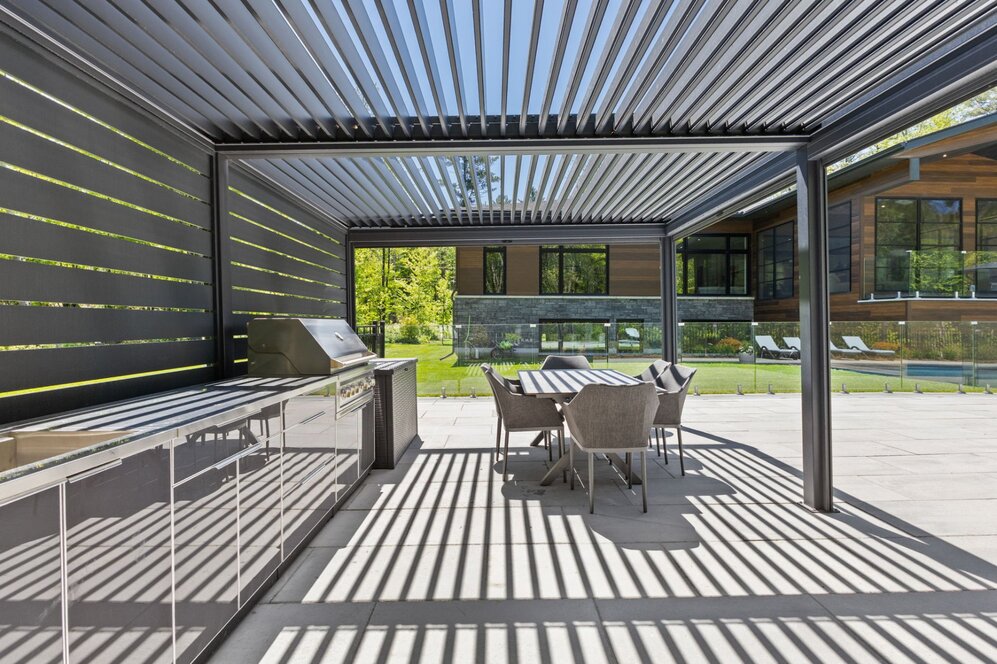 Backyard - Pergola with retractable solar shades all around