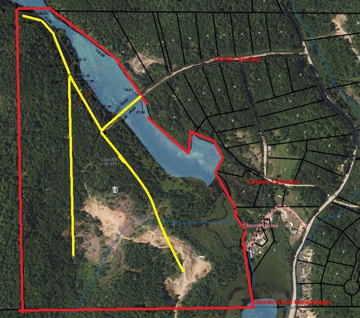 Aerial photo - Property limit in red.Planned roads in yellow