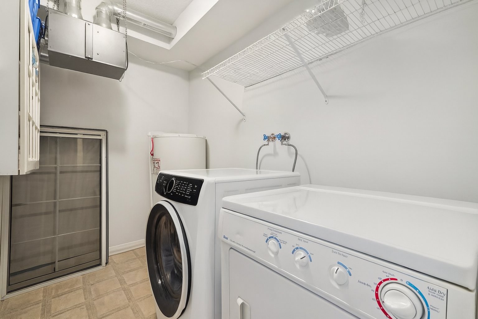 Laundry room - New LG appliances (not the ones shown in the photo